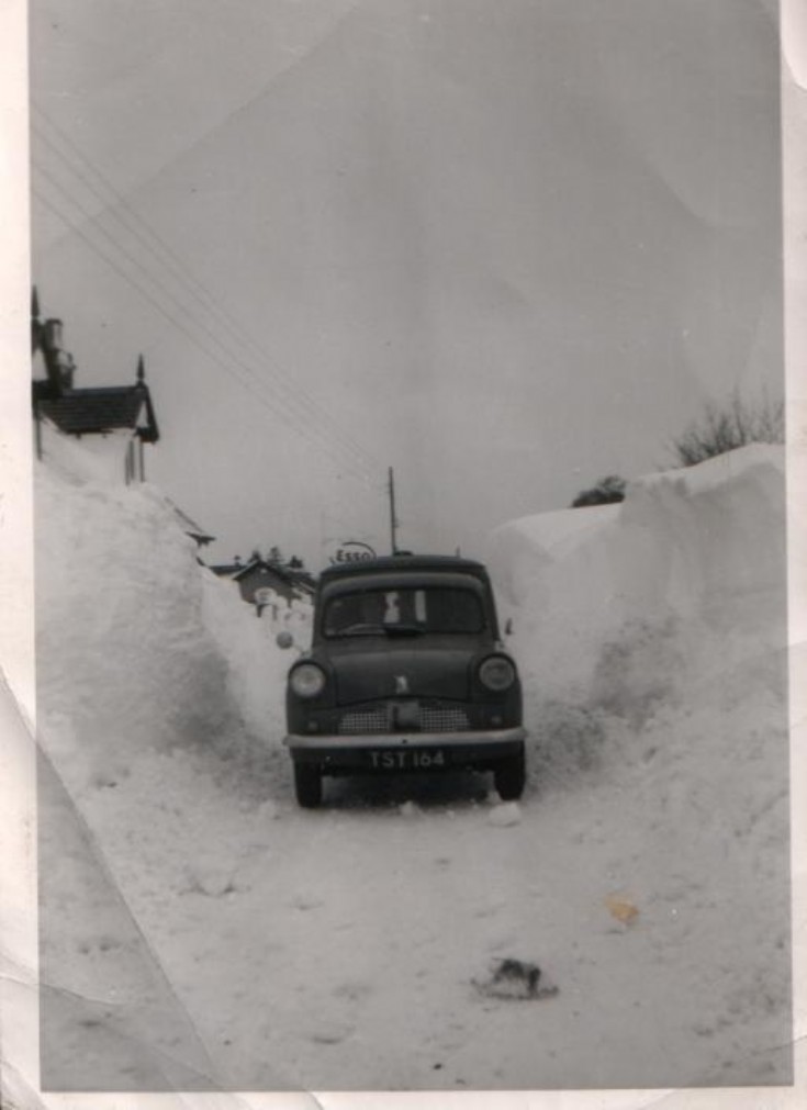 Car by Esso sign c1940s?