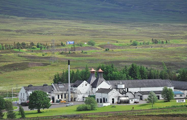A view of Dalwhinnie Distillery, A9 in the background