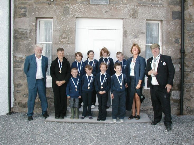 Group wearing Burns medals